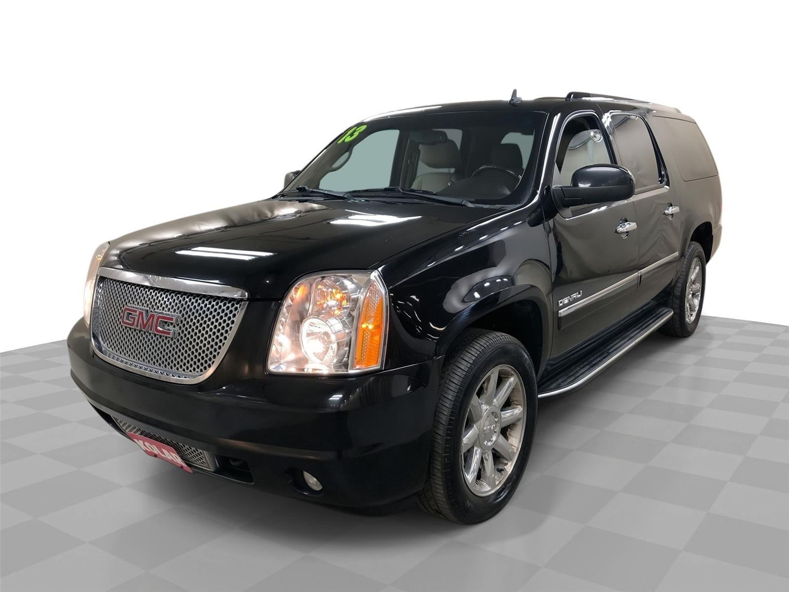 2013 GMC Yukon XL Denali in Onyx Black — front three-quarter view