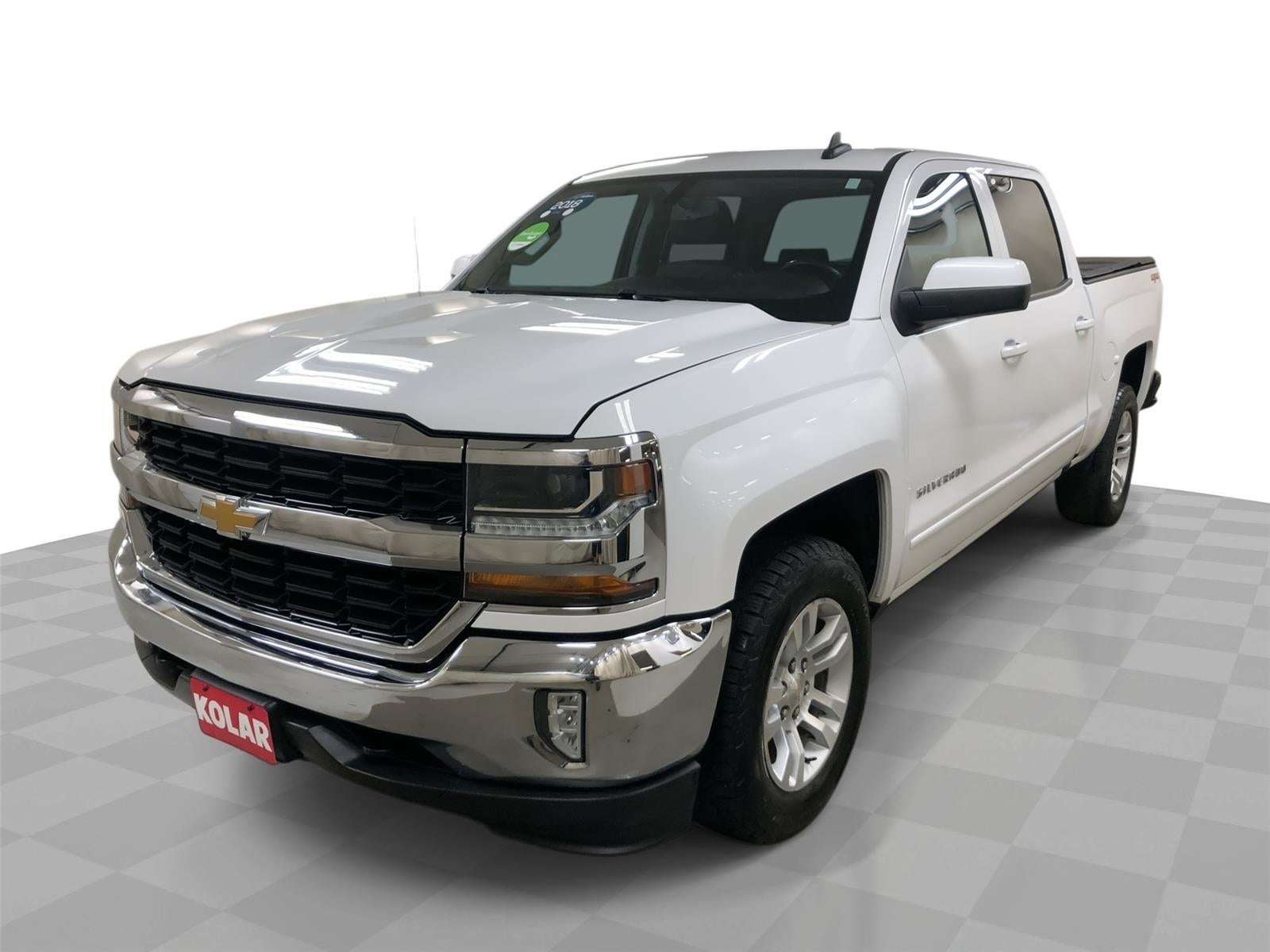 2018 Chevrolet Silverado 1500 LT in Summit White — front three-quarter view